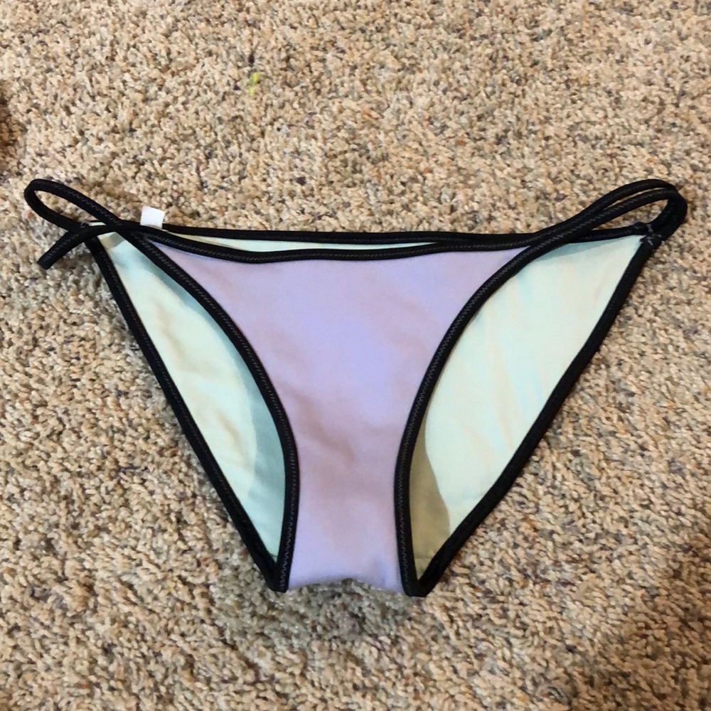 purple Victoria secret bathing suit bottom